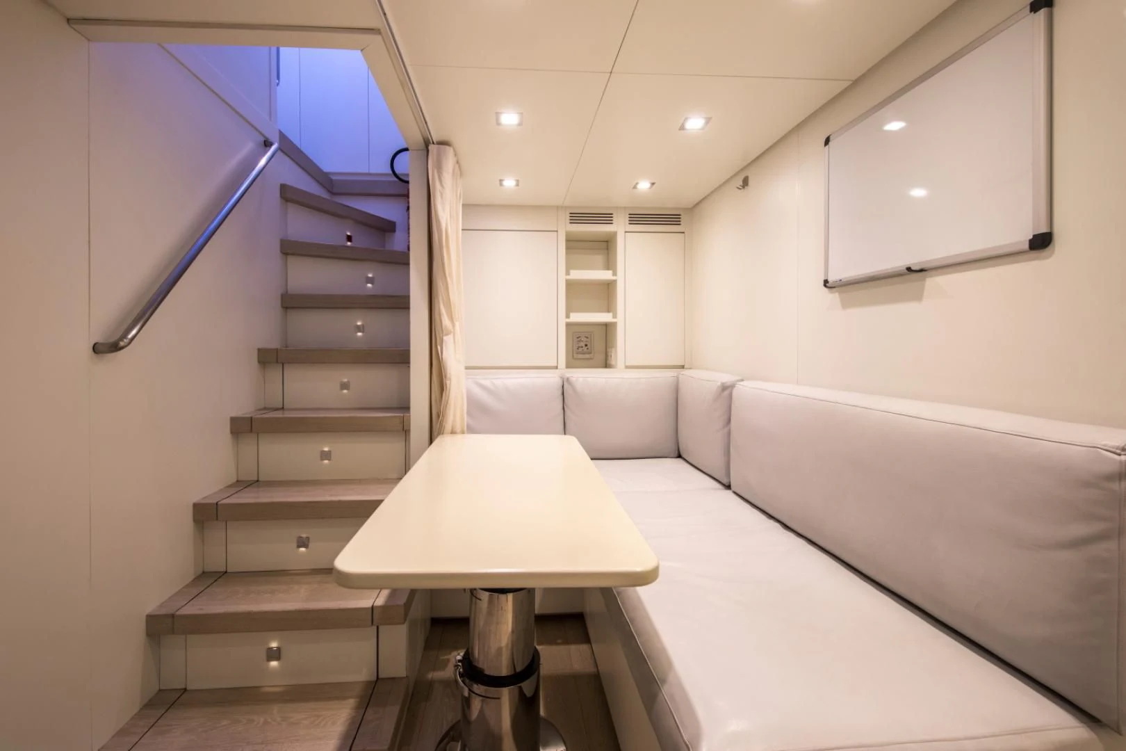 a room with a bed and a desk aboard MAI Yacht for Sale