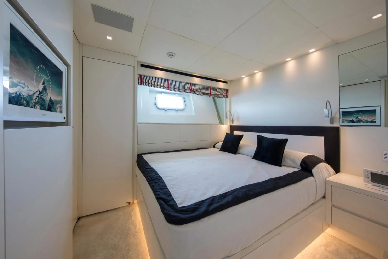 a bed in a room aboard MAI Yacht for Sale