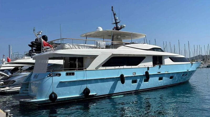 a white yacht in the water aboard MAI Yacht for Sale