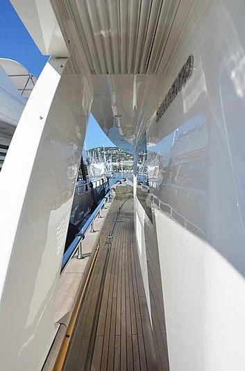 a view of a city from a window aboard MAI Yacht for Sale