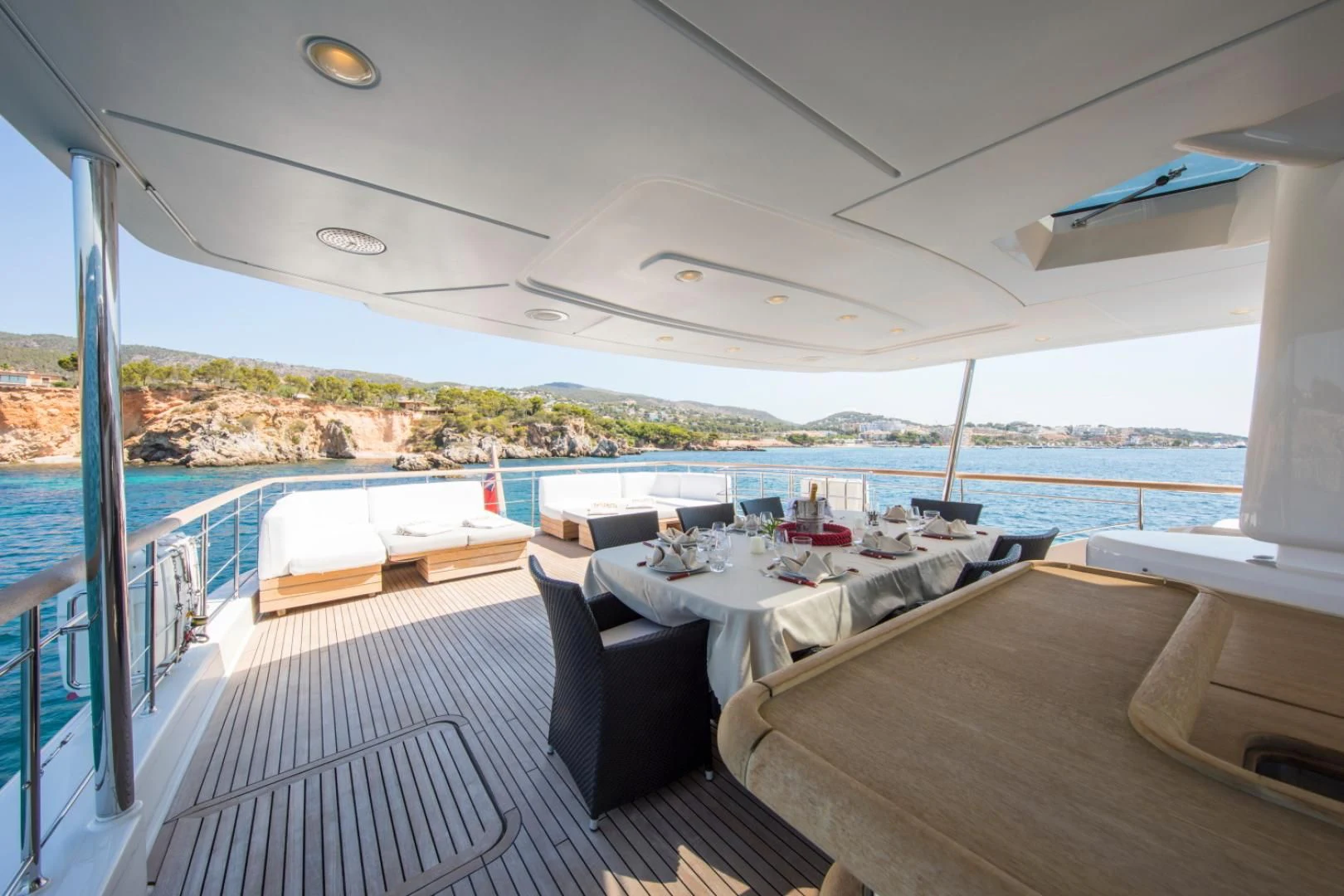a room with a view of the water and the land aboard MAI Yacht for Sale
