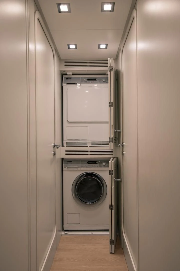 a white machine in a room aboard MAI Yacht for Sale