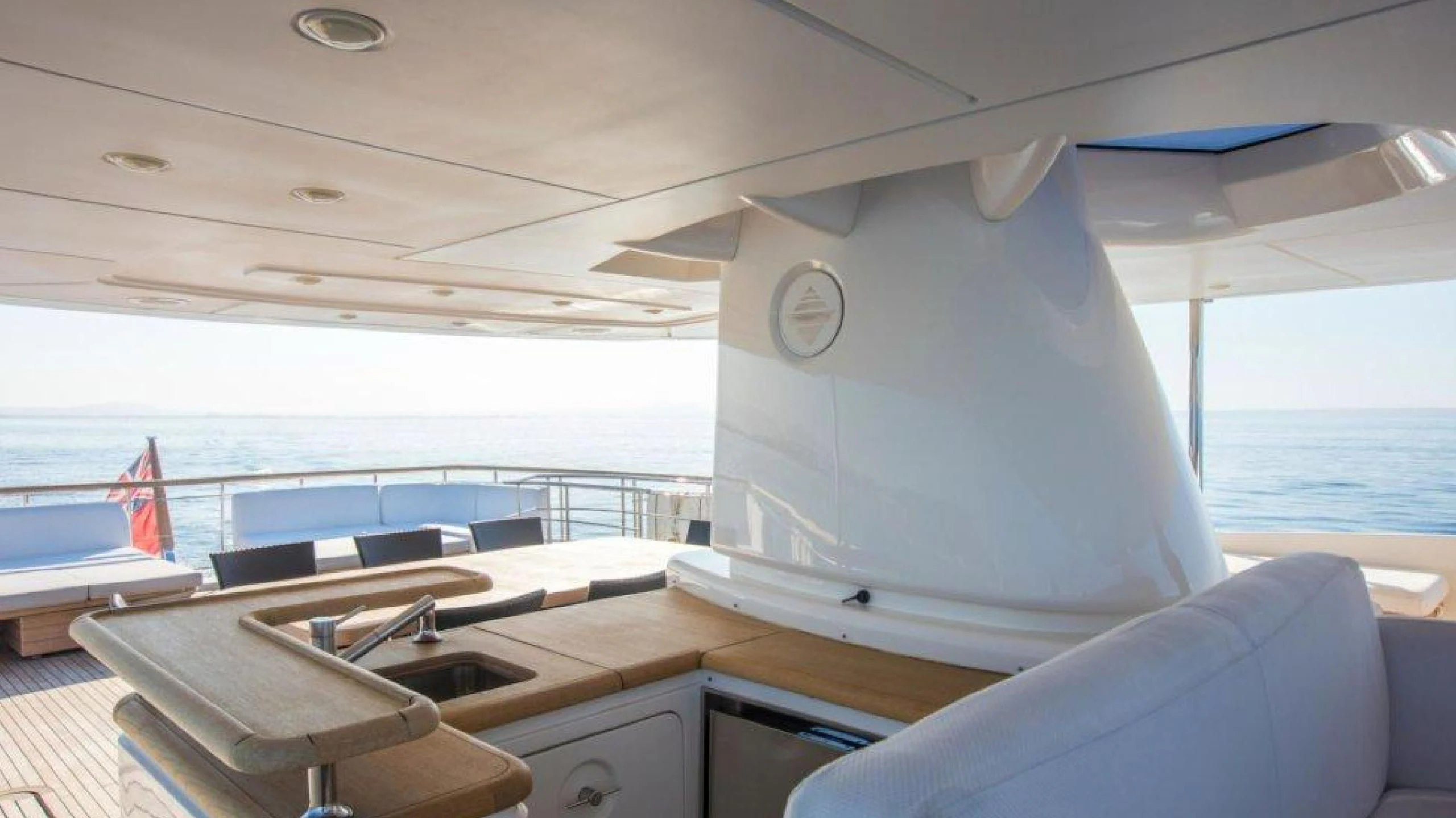 a boat with a large sail aboard MAI Yacht for Sale