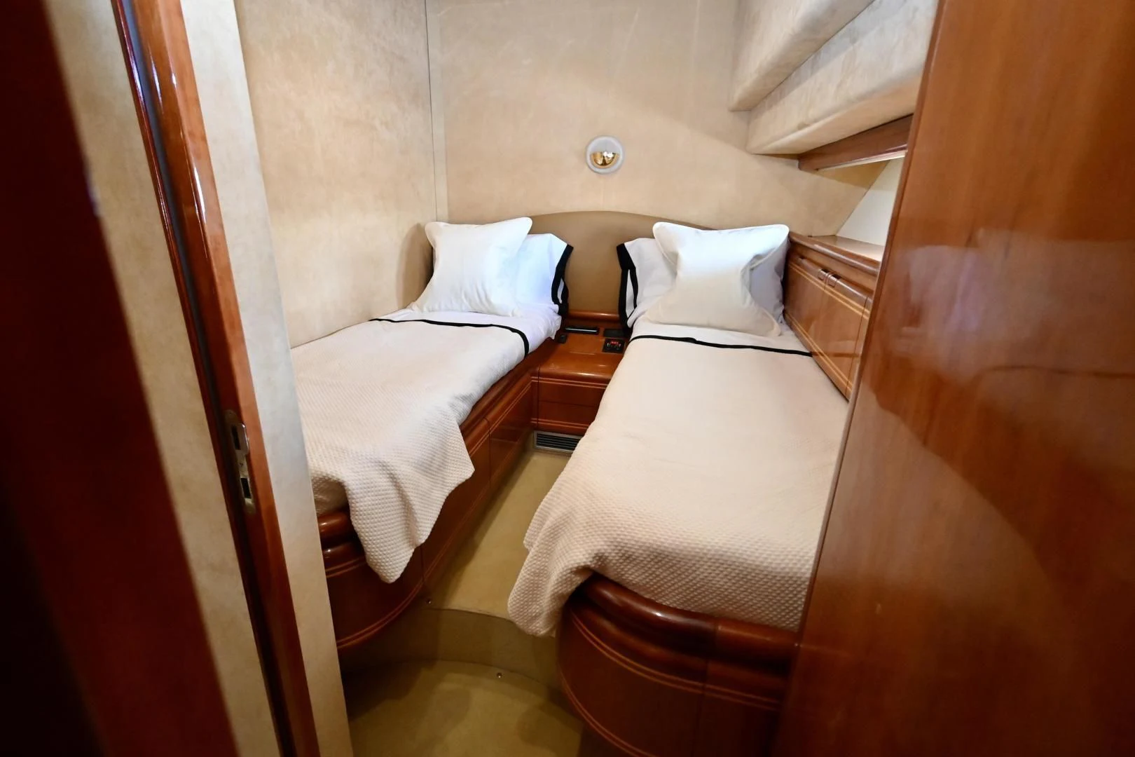 a couple of beds in a room aboard RABBIT Yacht for Sale