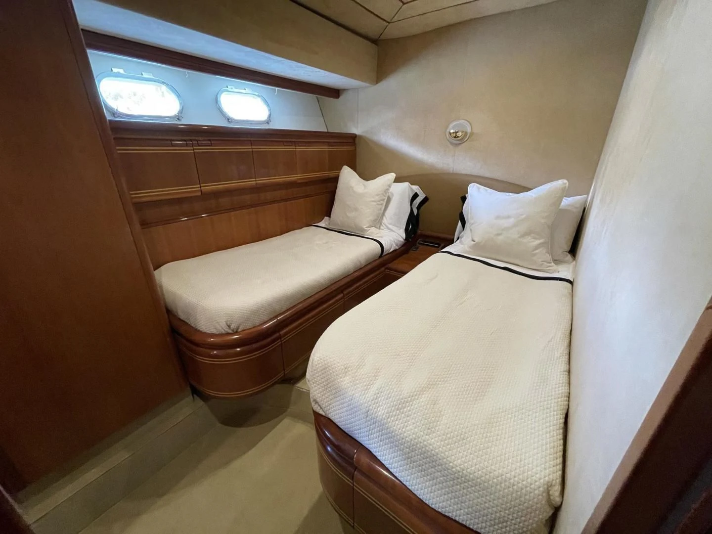 a couple of beds in a room aboard RABBIT Yacht for Sale