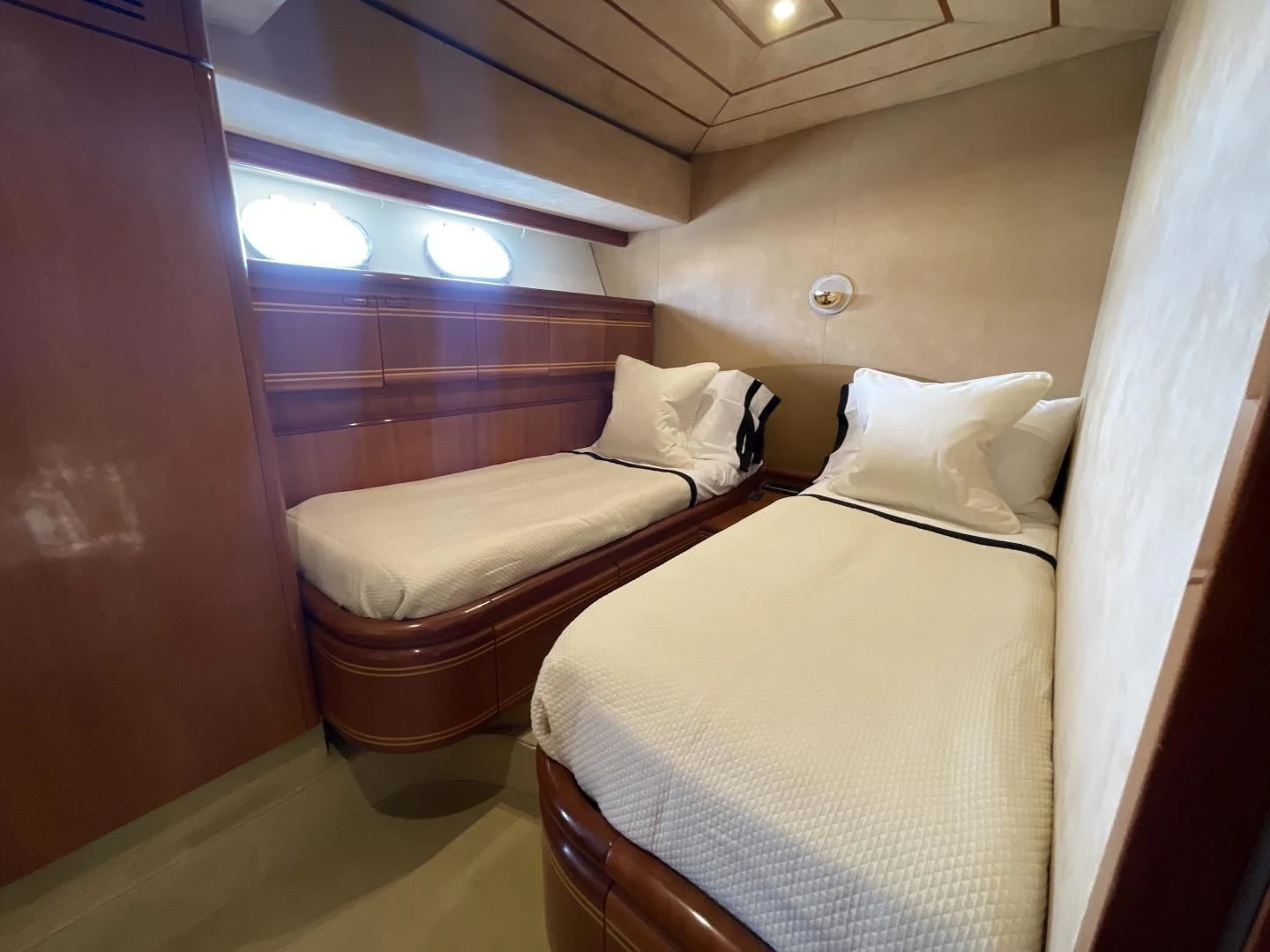 a couple of beds in a room aboard RABBIT Yacht for Sale