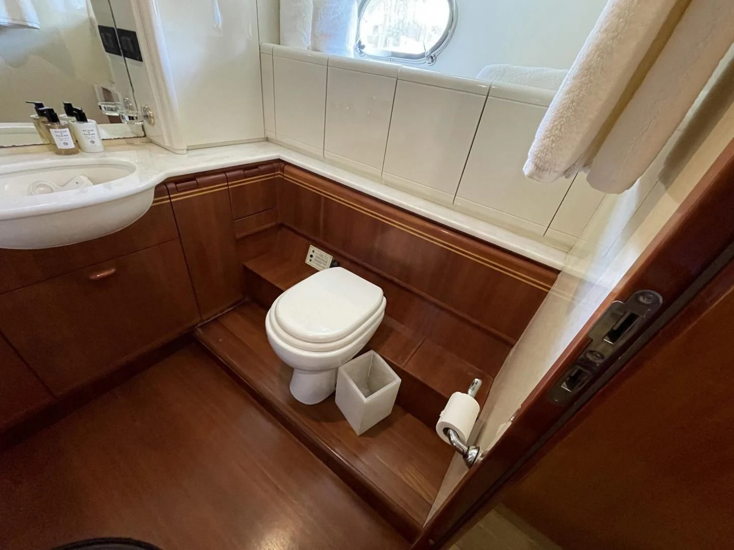 a bathroom with a toilet and sink aboard RABBIT Yacht for Sale