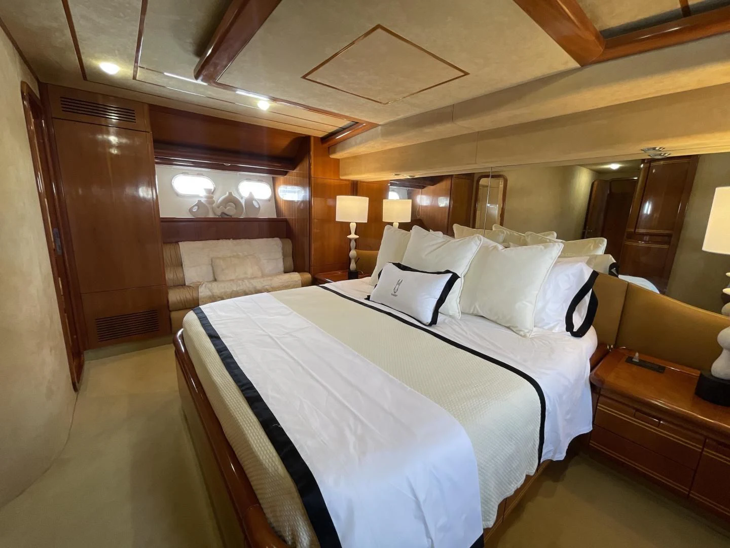 a large bed in a room aboard RABBIT Yacht for Sale