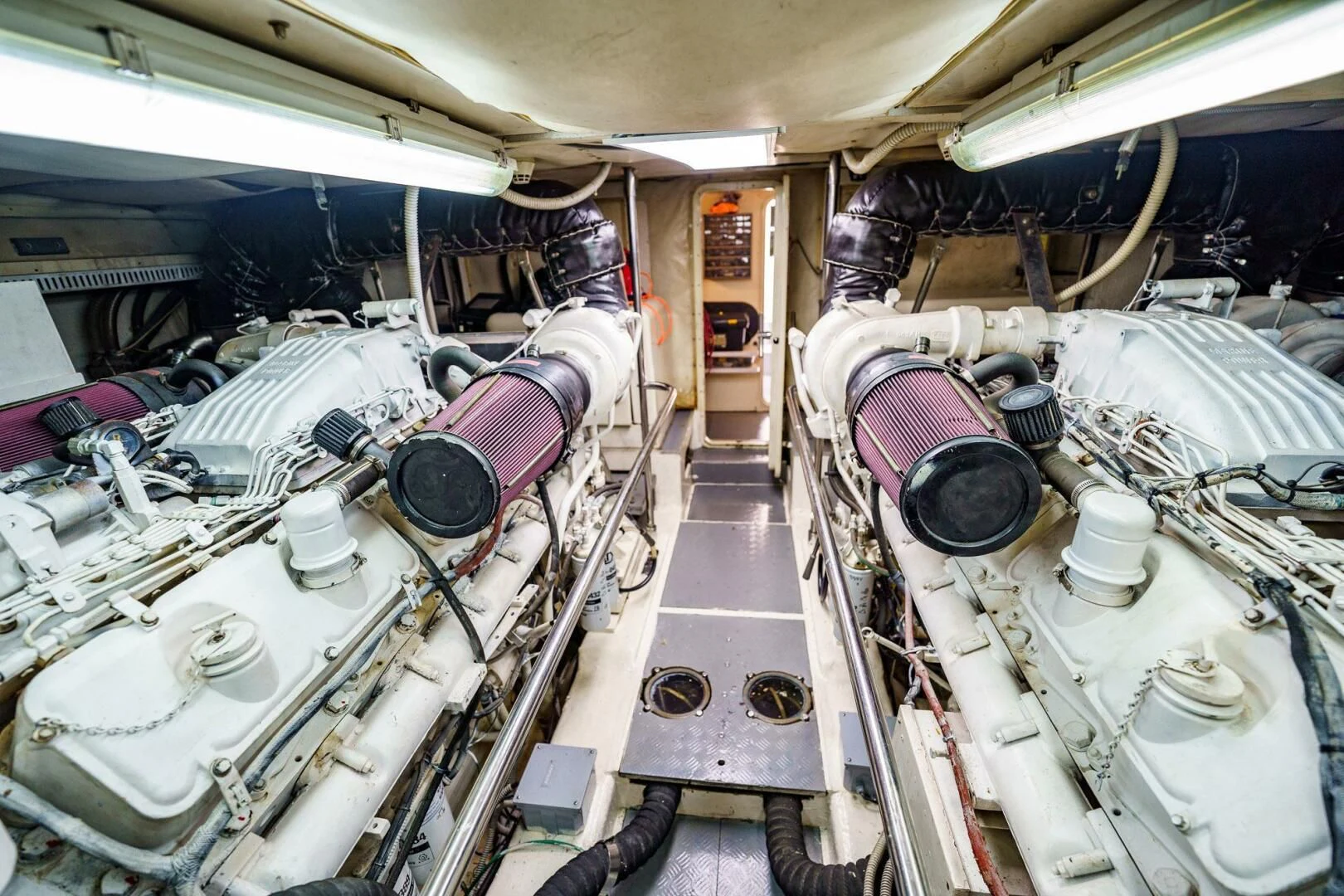 a room with many pipes and tubes aboard RABBIT Yacht for Sale