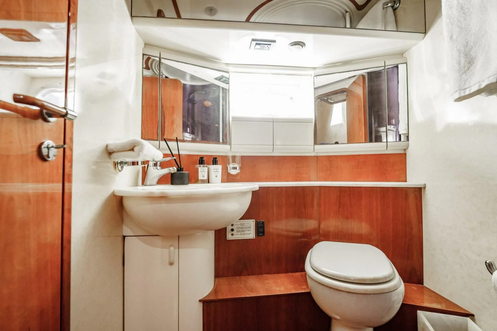 a bathroom with a toilet and sink aboard RABBIT Yacht for Sale