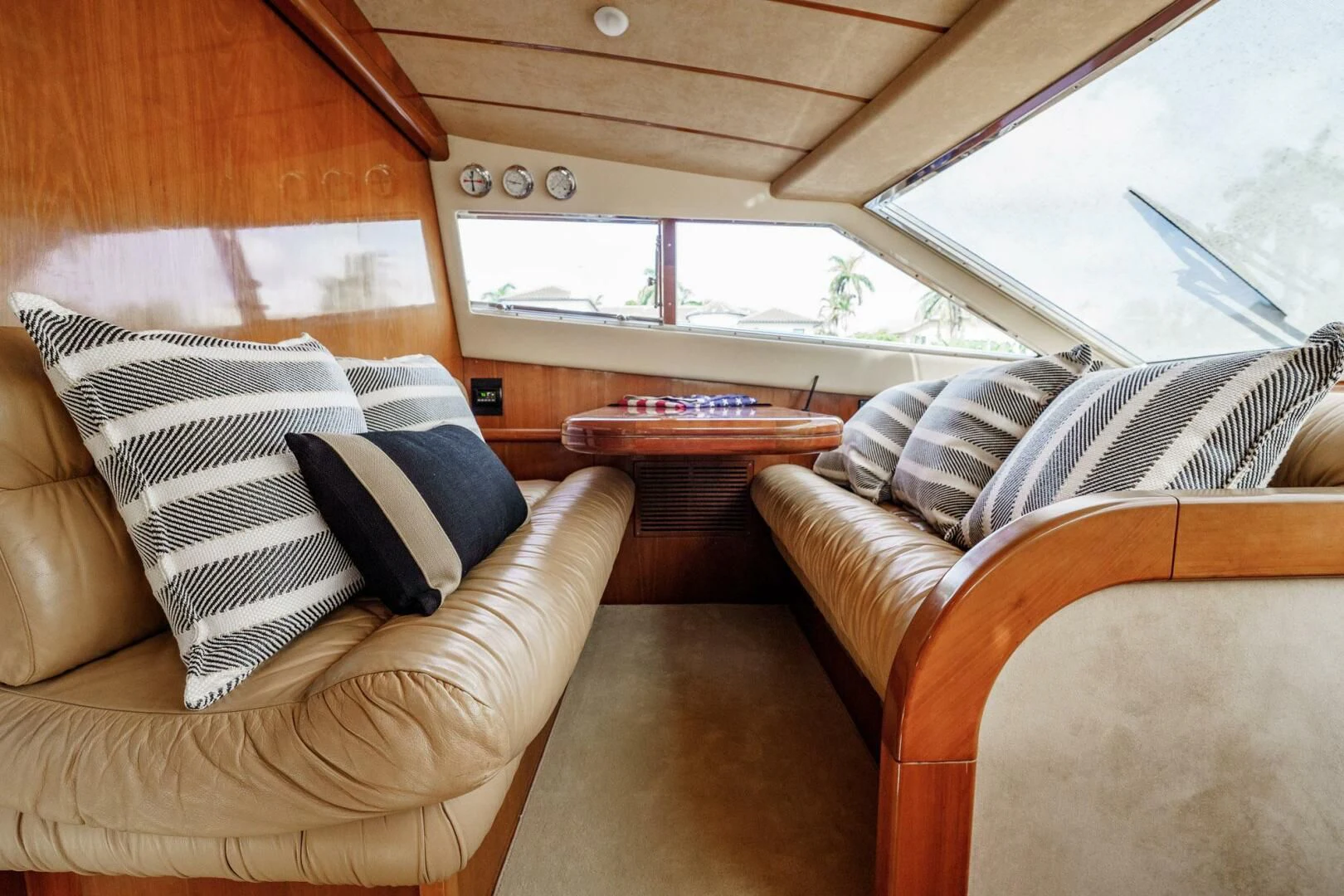 a cabin with a bed and a table aboard RABBIT Yacht for Sale