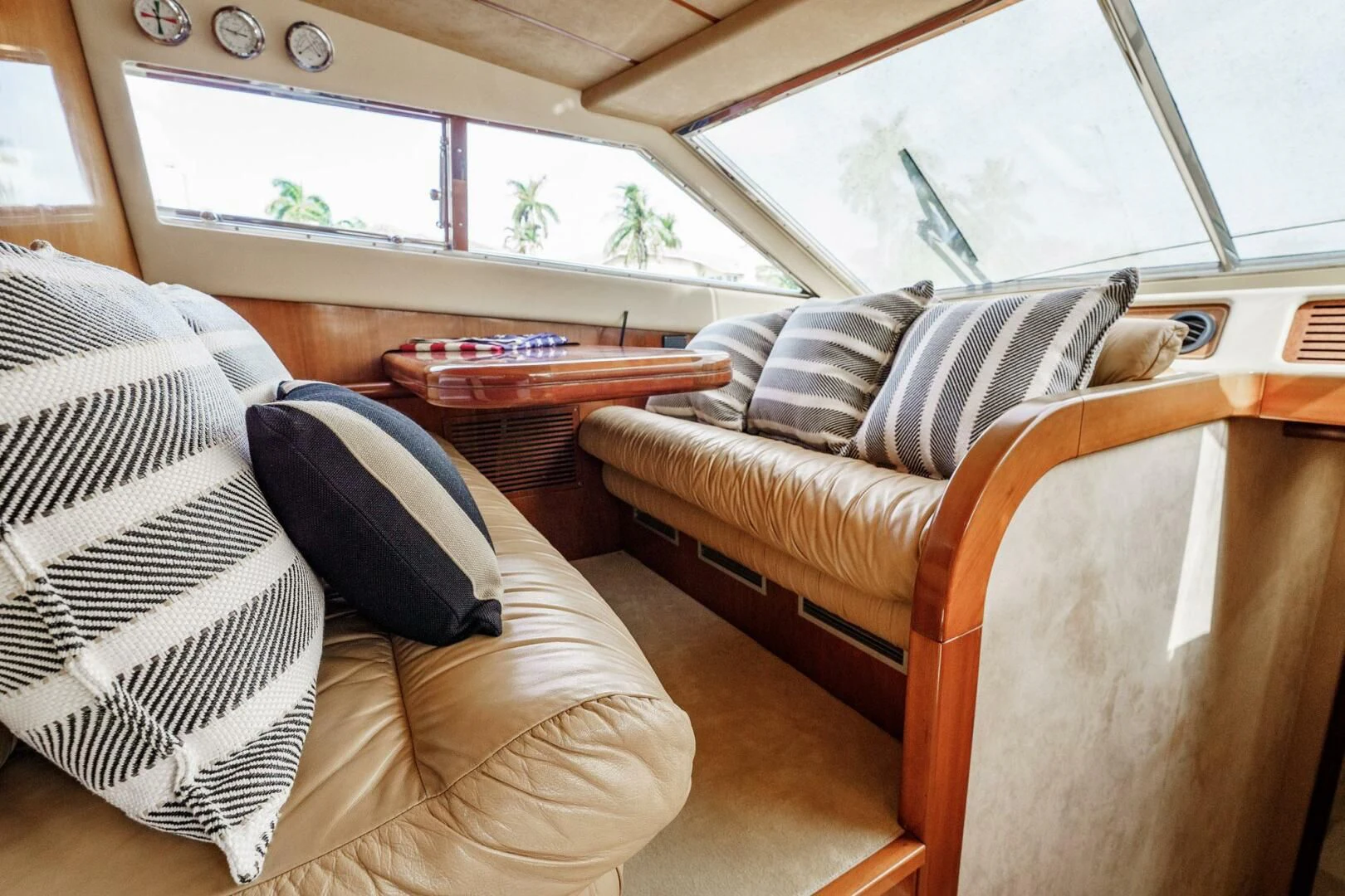 a room with a couch and a table aboard RABBIT Yacht for Sale