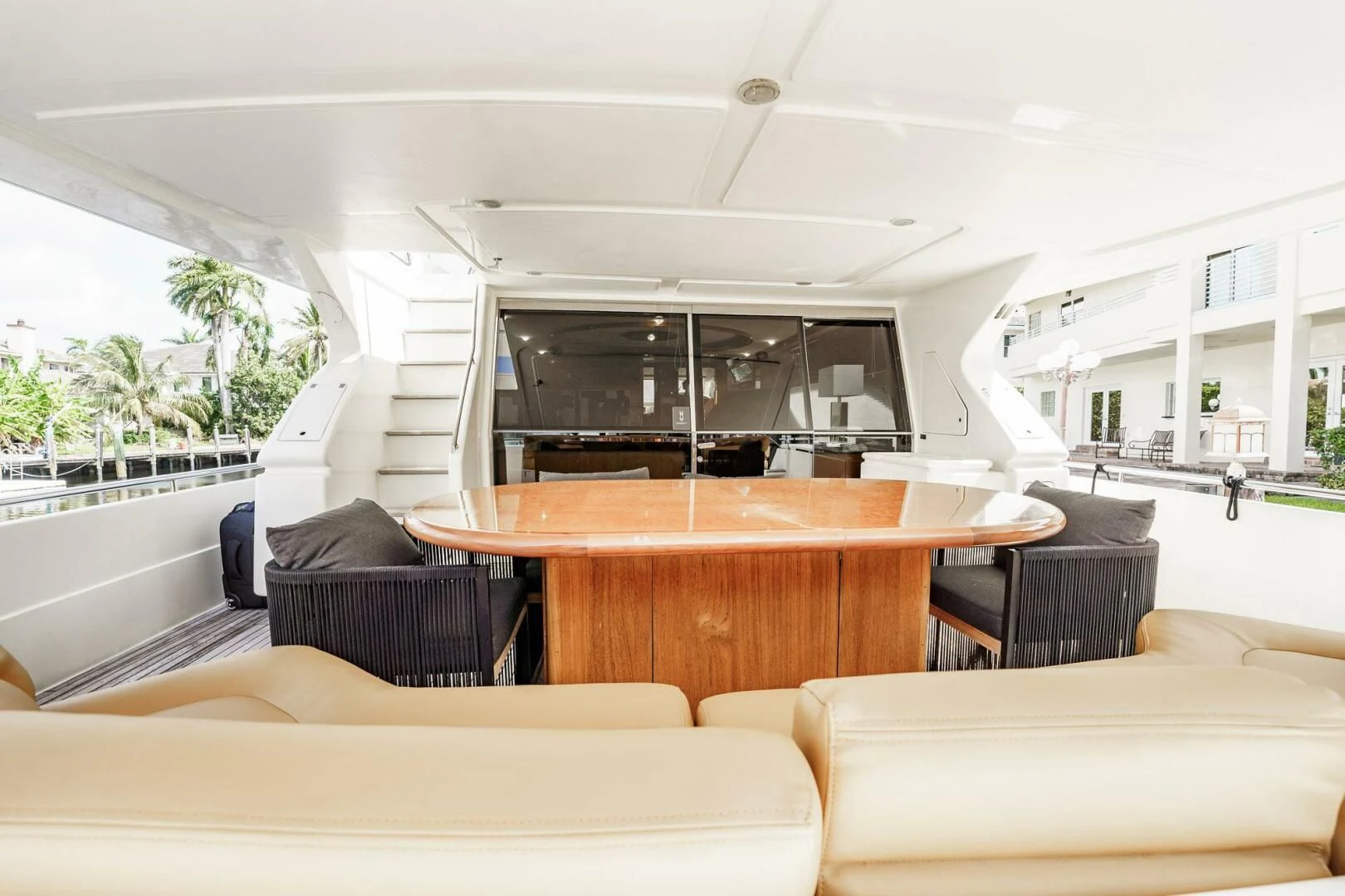 a living room with a table and chairs aboard RABBIT Yacht for Sale
