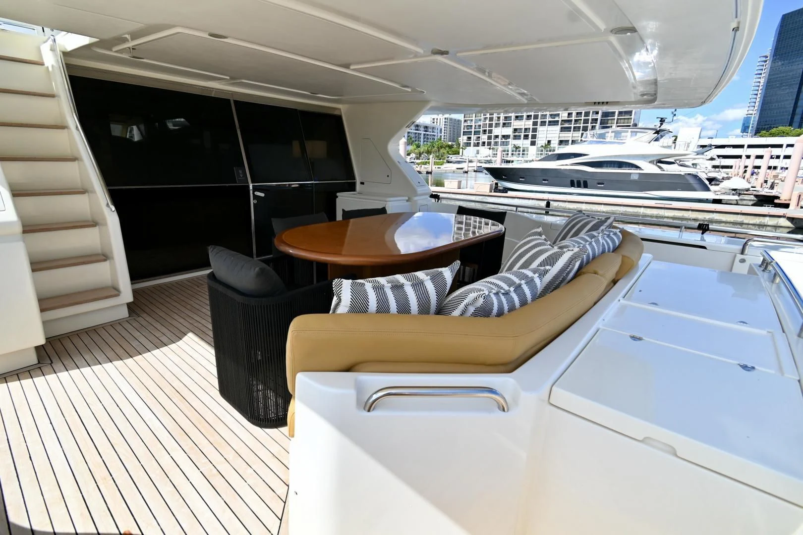a room with a table chairs and a large window aboard RABBIT Yacht for Sale