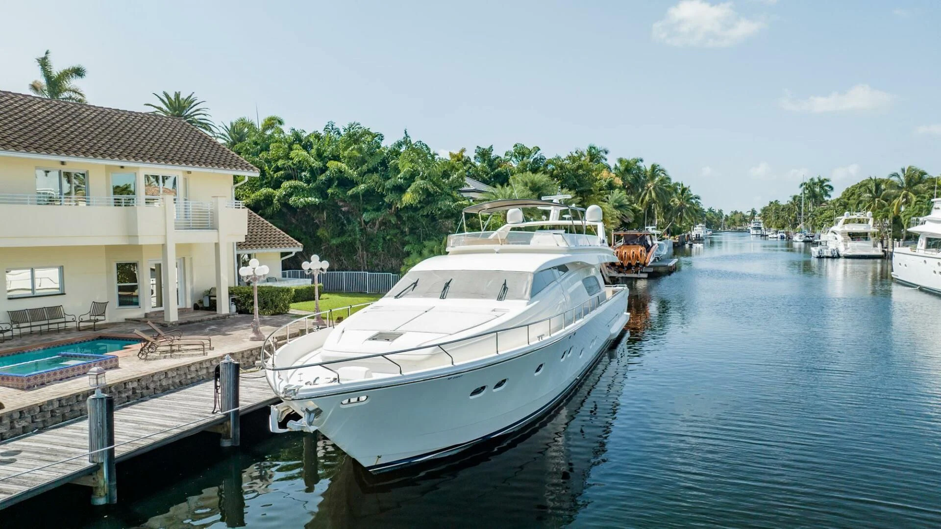 a boat docked at a pier aboard RABBIT Yacht for Sale