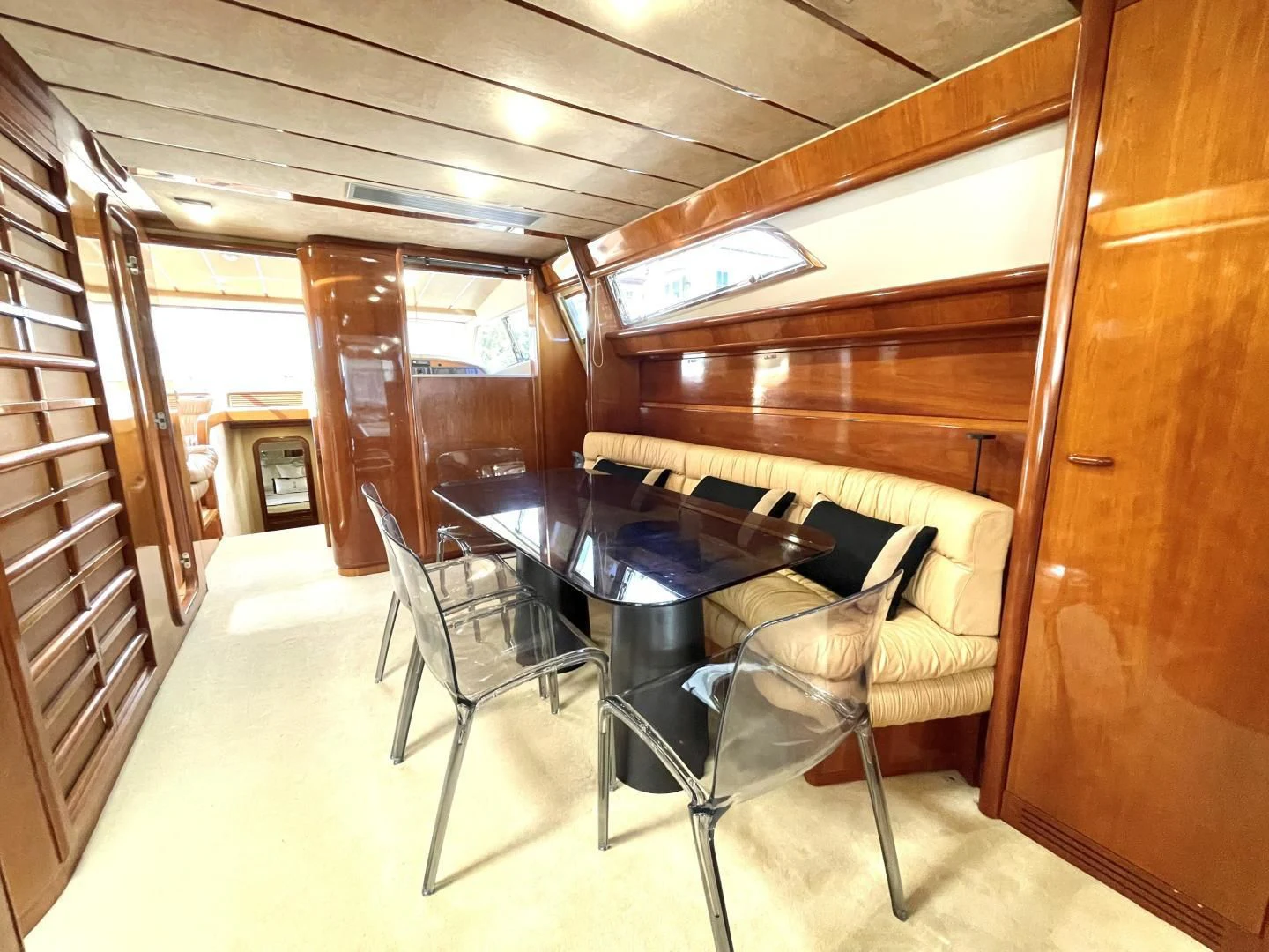a room with a table and chairs aboard RABBIT Yacht for Sale