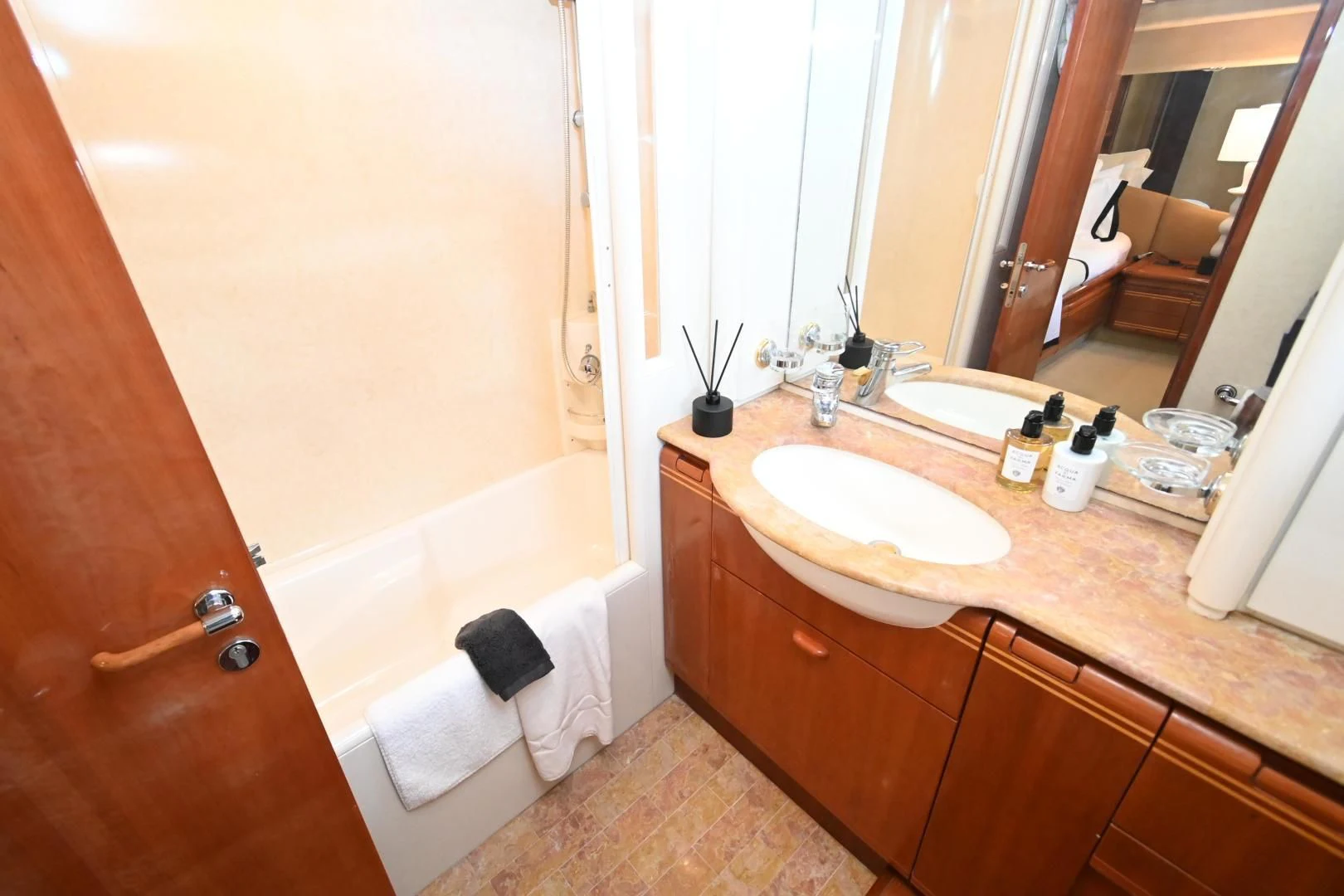 a bathroom with a sink and a bathtub aboard RABBIT Yacht for Sale