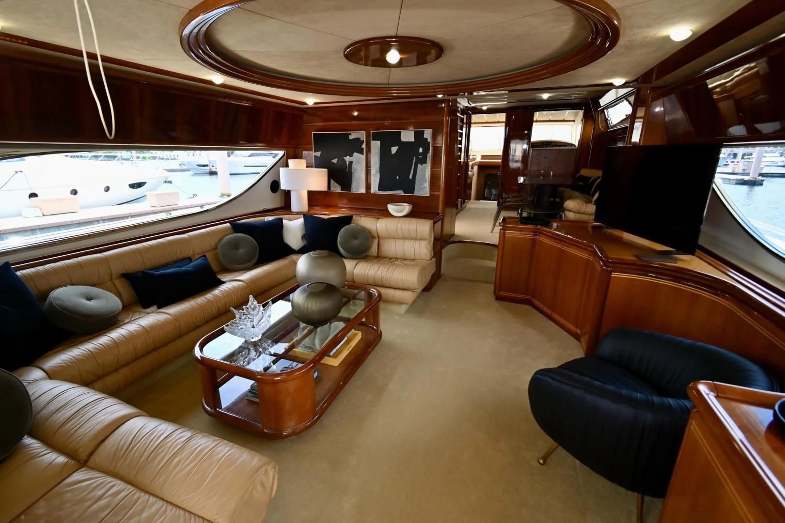 a room with a couch and a table aboard RABBIT Yacht for Sale