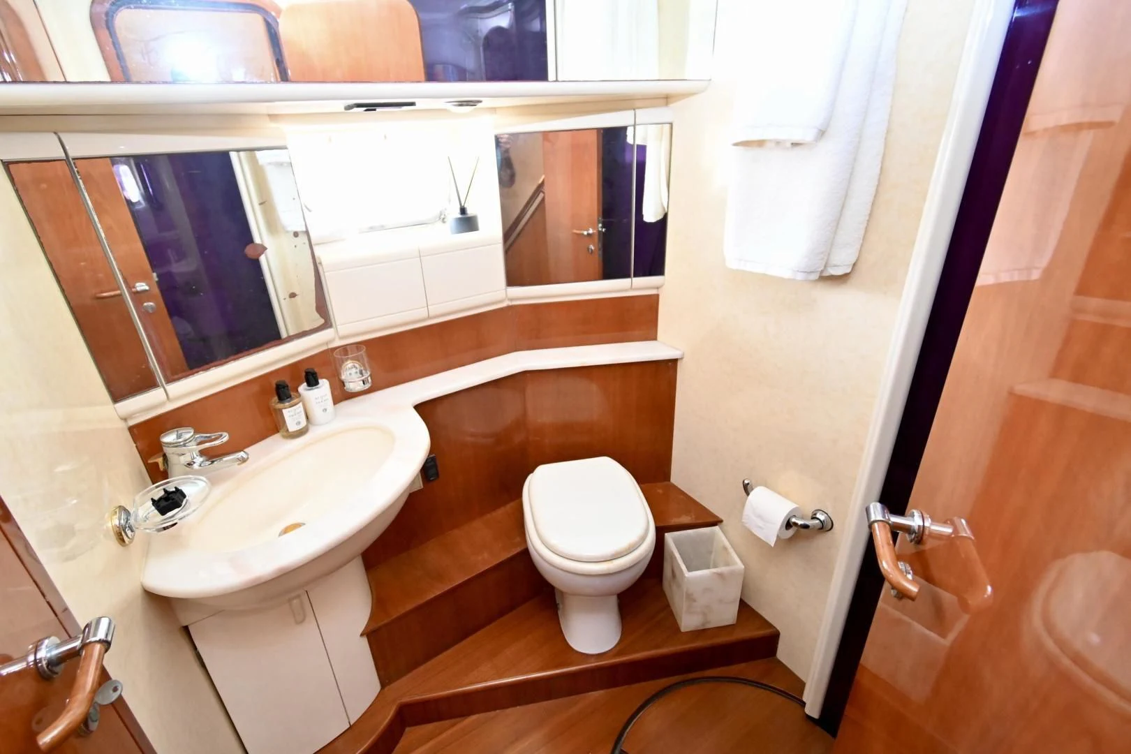 a bathroom with a toilet and sink aboard RABBIT Yacht for Sale