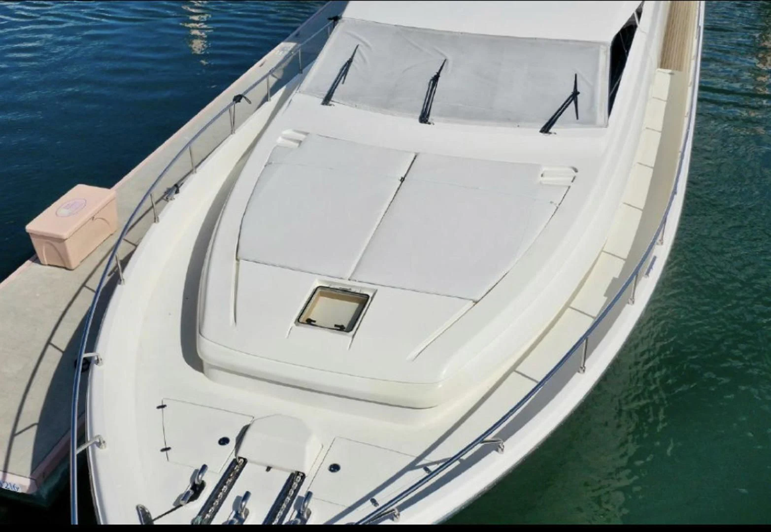 a white boat in the water aboard RABBIT Yacht for Sale