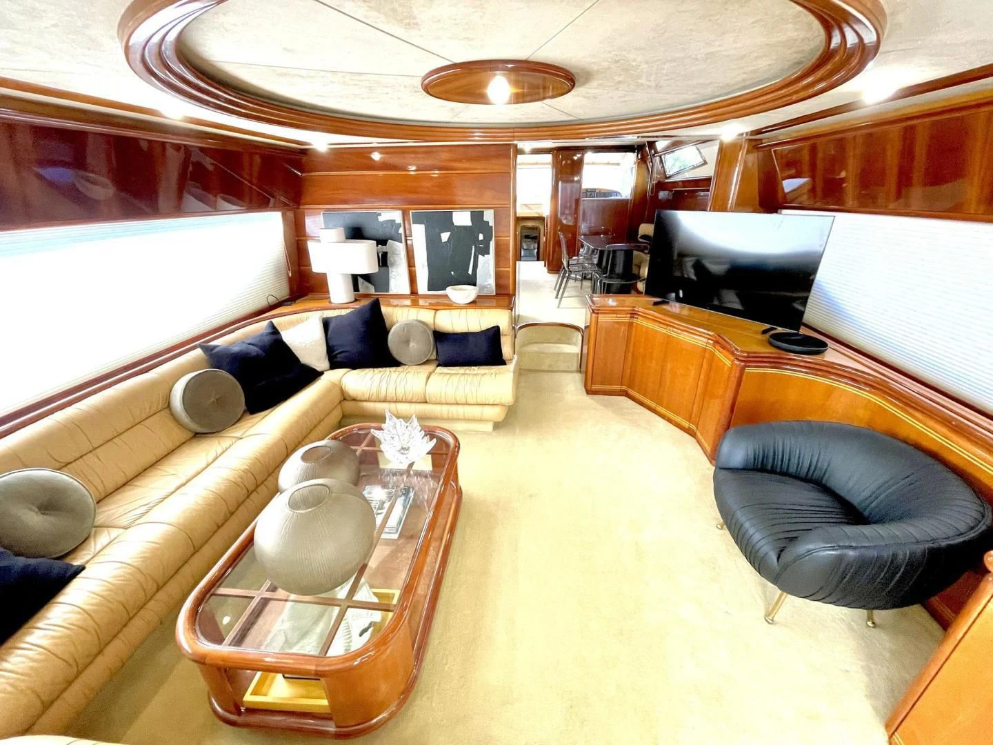 a large room with a large lounge chair and a large window aboard RABBIT Yacht for Sale