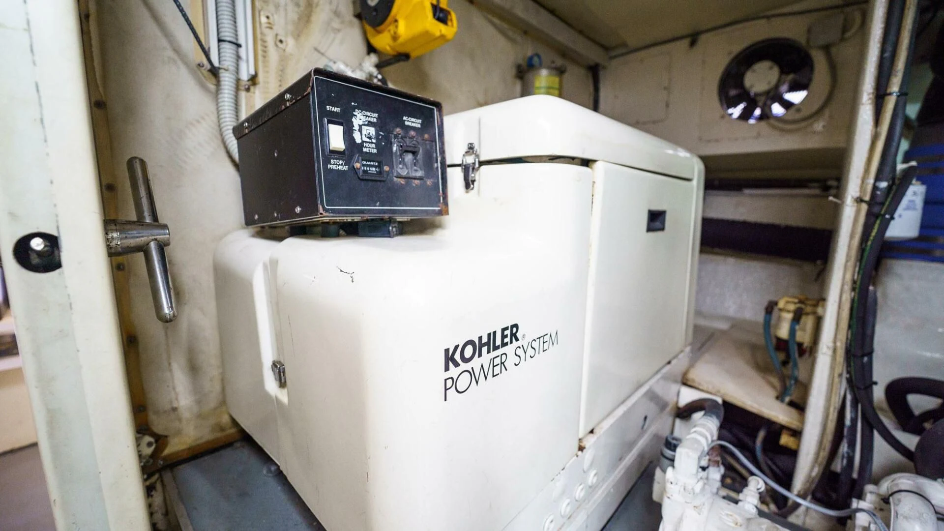 a large white machine aboard RABBIT Yacht for Sale