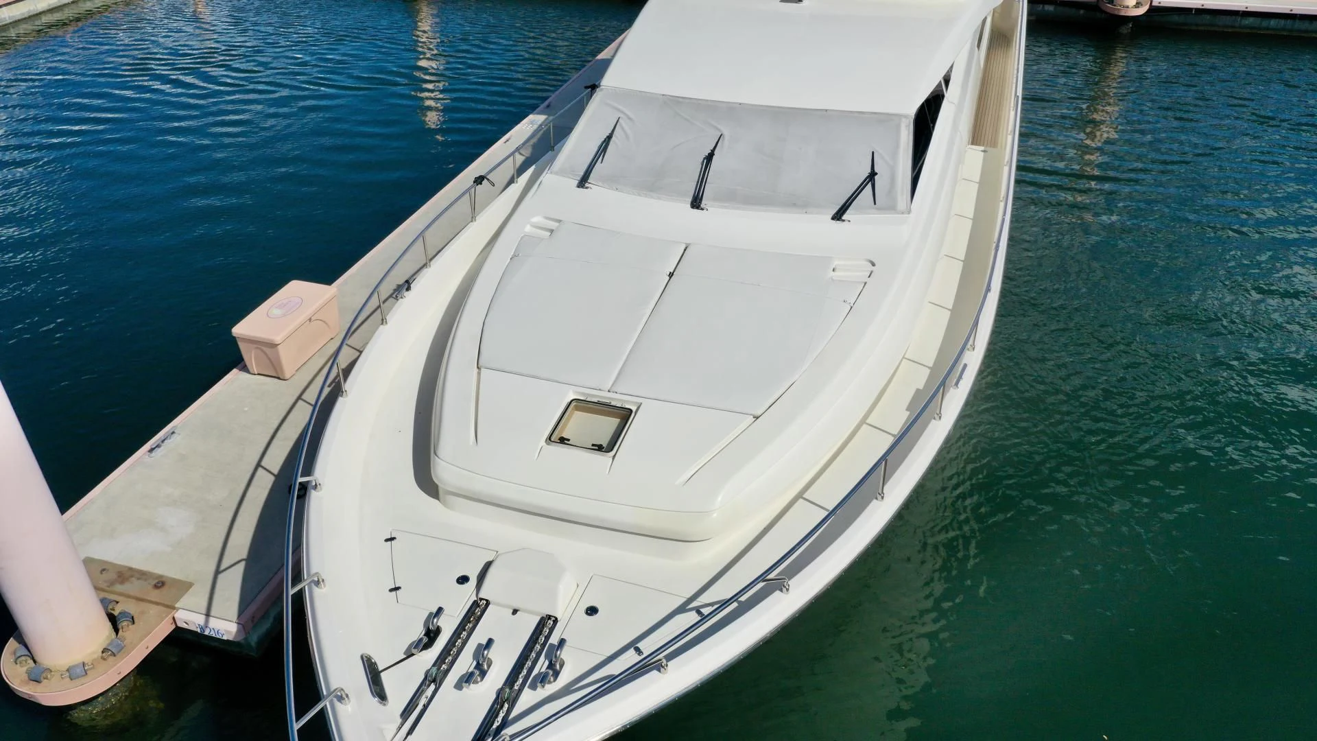 a white boat in the water aboard RABBIT Yacht for Sale