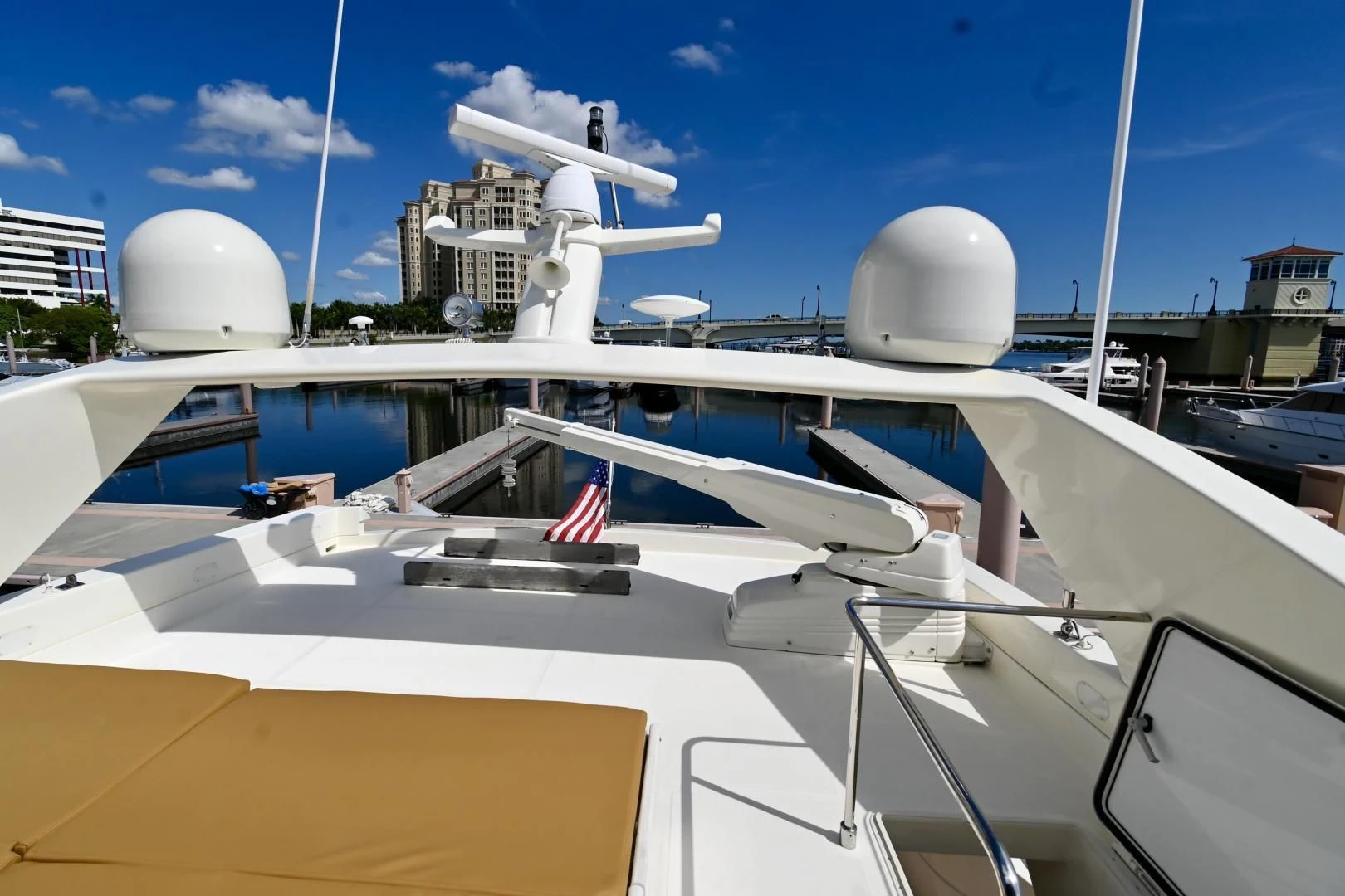 a boat with a flag on the front aboard RABBIT Yacht for Sale