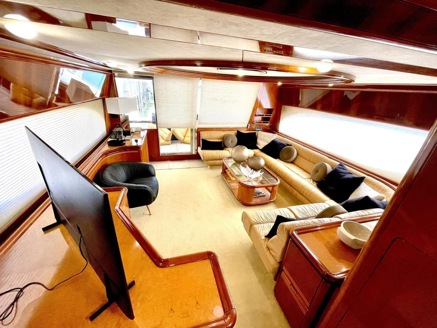 a room with a couch and a table aboard RABBIT Yacht for Sale