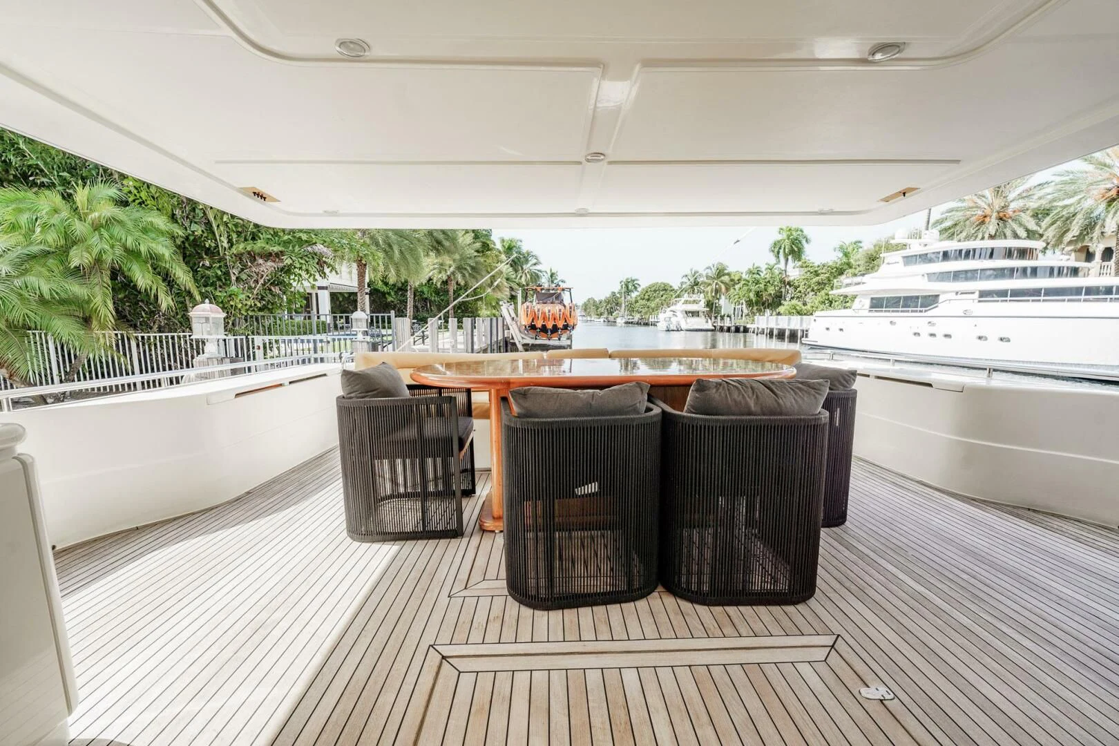 a table and chairs on a deck aboard RABBIT Yacht for Sale