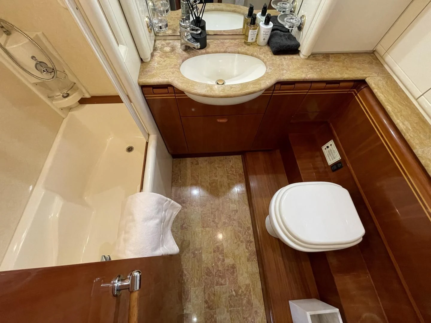 a bathroom with a sink and tub aboard RABBIT Yacht for Sale
