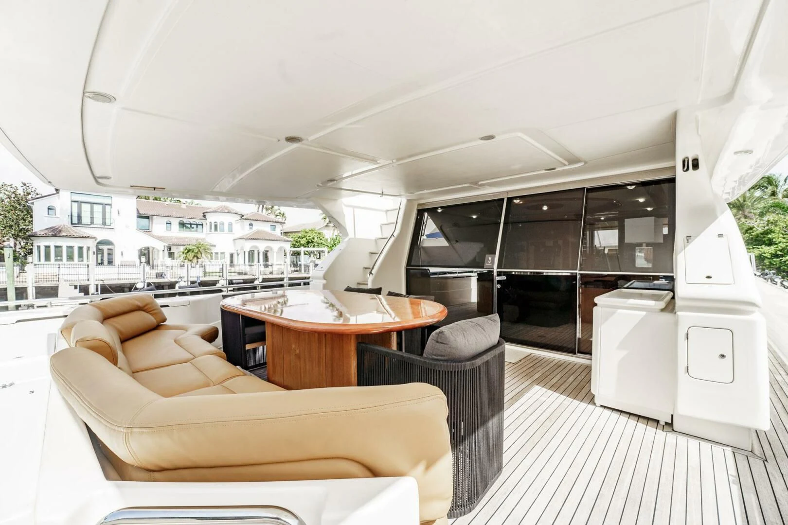 a table and chairs in a room aboard RABBIT Yacht for Sale