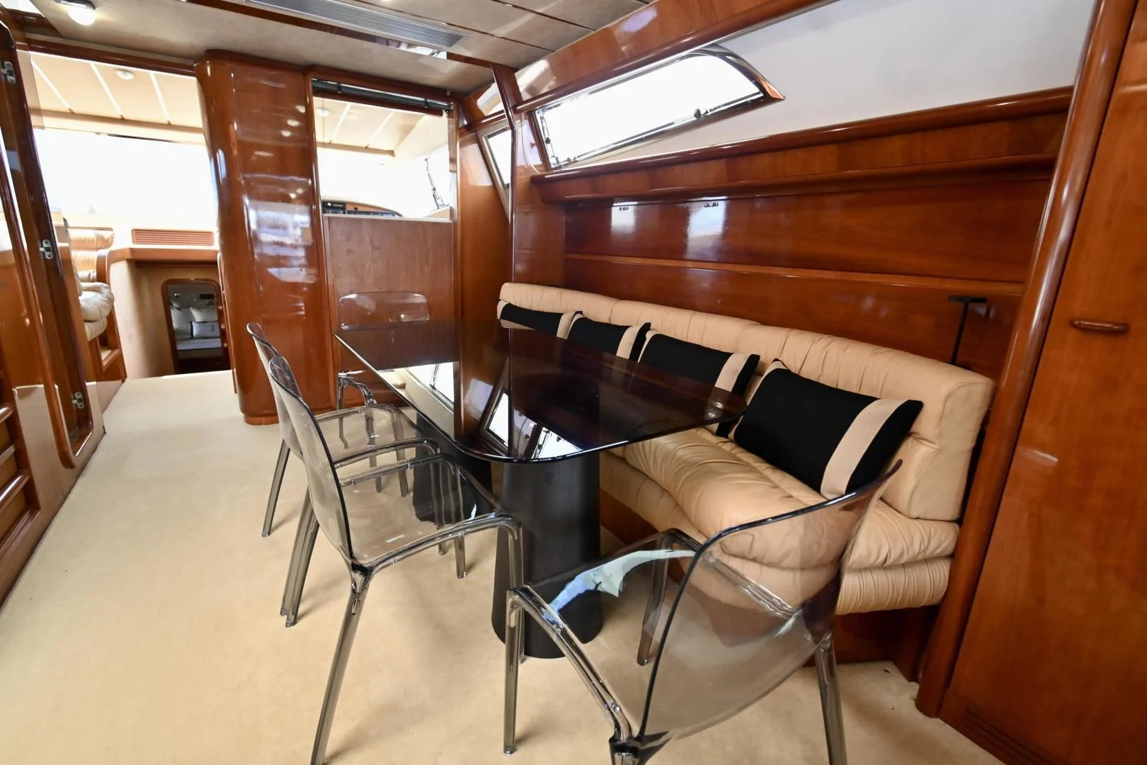 a room with chairs and a table aboard RABBIT Yacht for Sale