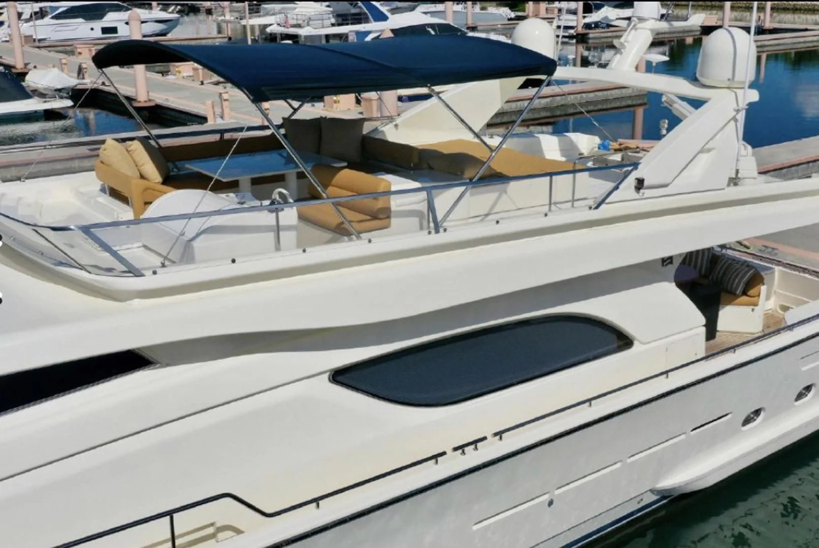 a boat is parked in a harbor aboard RABBIT Yacht for Sale