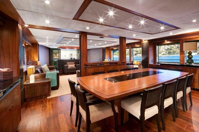 a large kitchen and dining area aboard THE DEVOCEAN Yacht for Sale