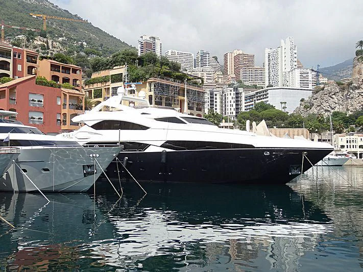 a boat docked at a pier aboard THE DEVOCEAN Yacht for Sale