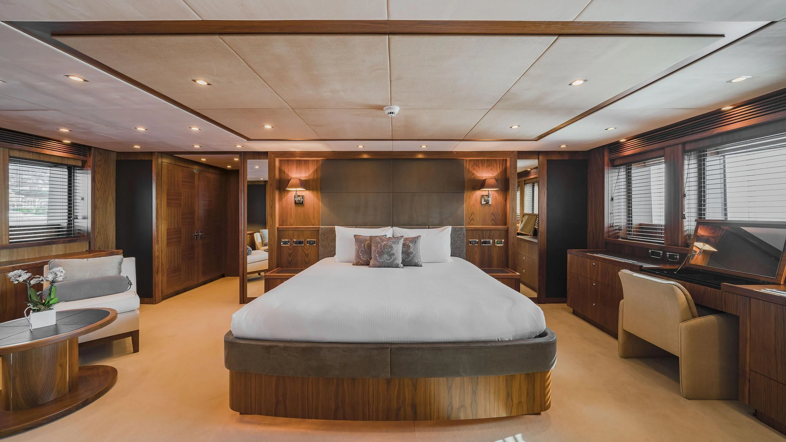 a large bedroom with a large bed aboard THE DEVOCEAN Yacht for Sale