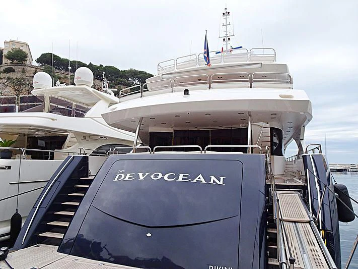 a boat docked at a pier aboard THE DEVOCEAN Yacht for Sale