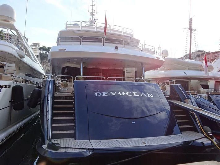 a boat with a blue cover aboard THE DEVOCEAN Yacht for Sale