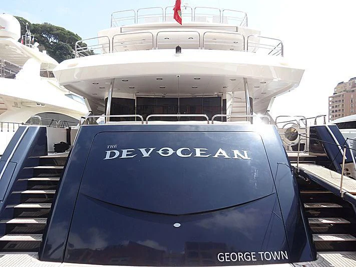 a boat on a dock aboard THE DEVOCEAN Yacht for Sale
