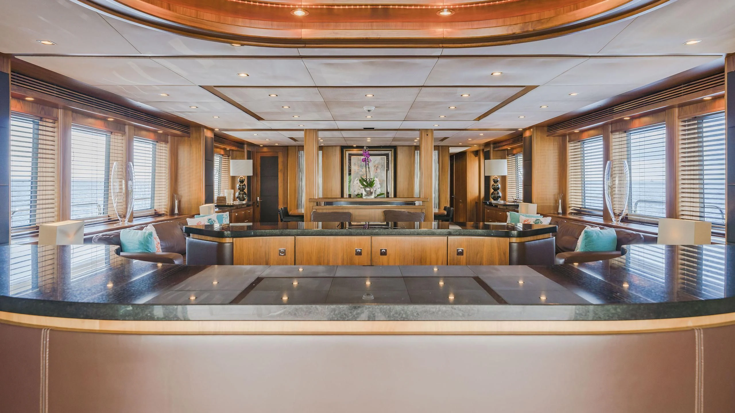 a large kitchen with a large island aboard THE DEVOCEAN Yacht for Sale