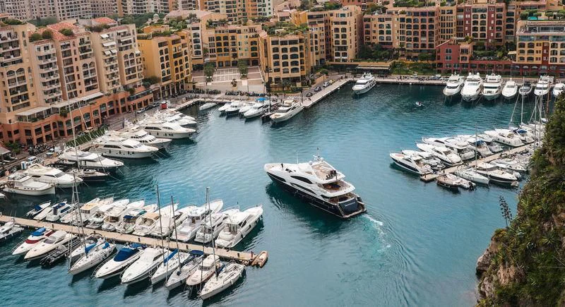 boats in a harbor aboard THE DEVOCEAN Yacht for Sale