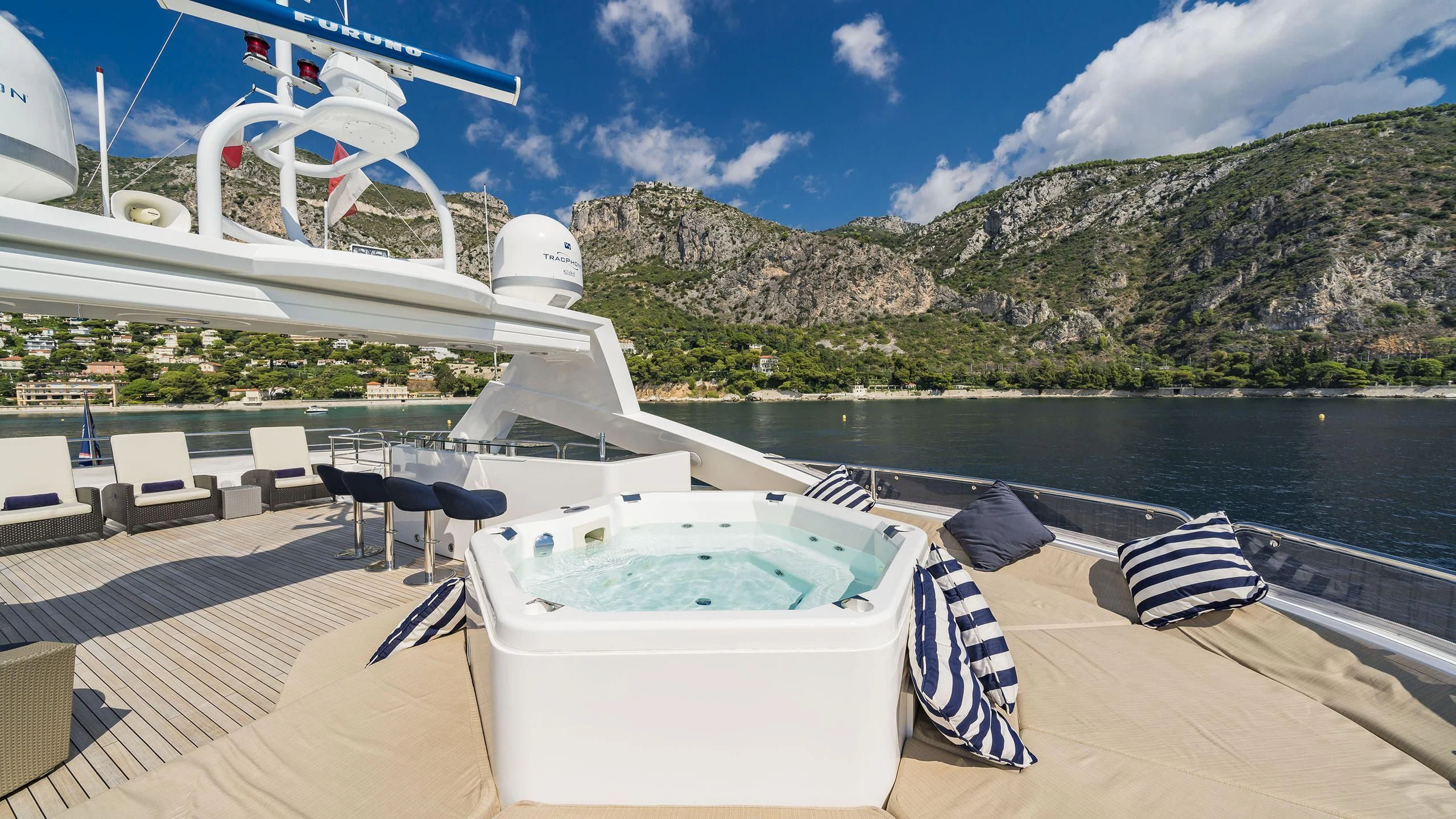 a boat on a deck aboard THE DEVOCEAN Yacht for Sale