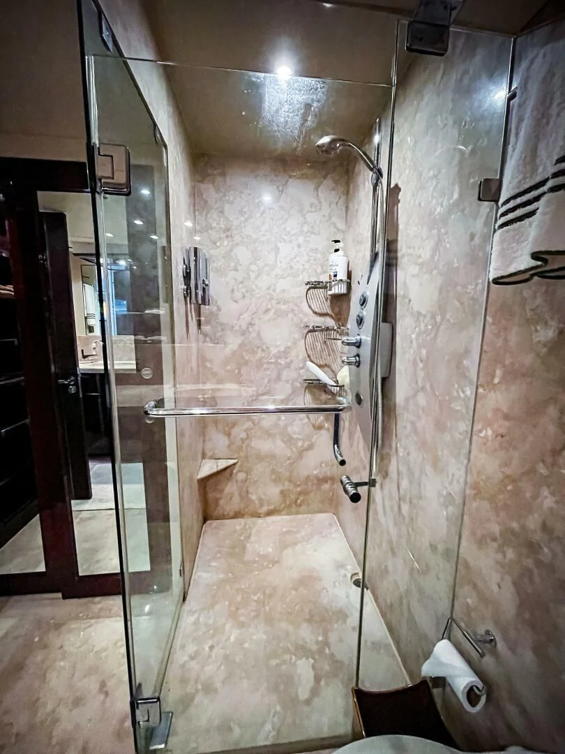a bathroom with a shower aboard LOVIN LIFE Yacht for Sale