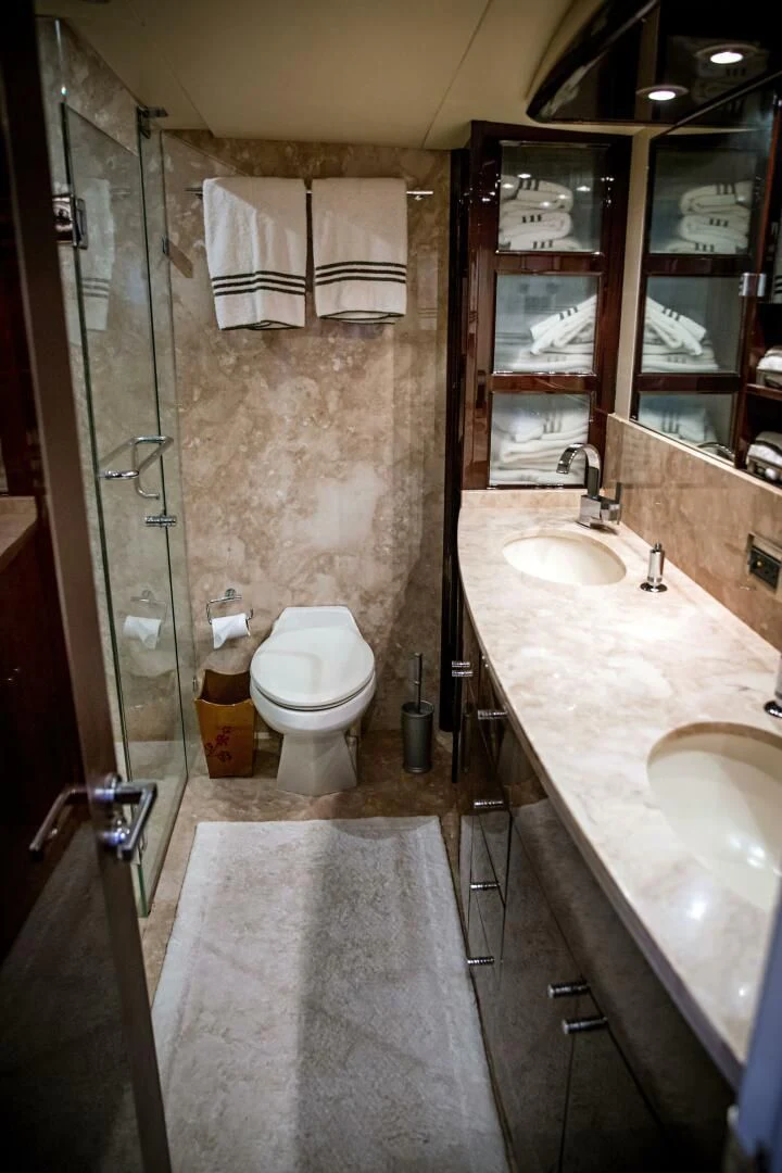 a bathroom with a sink and a toilet aboard LOVIN LIFE Yacht for Sale