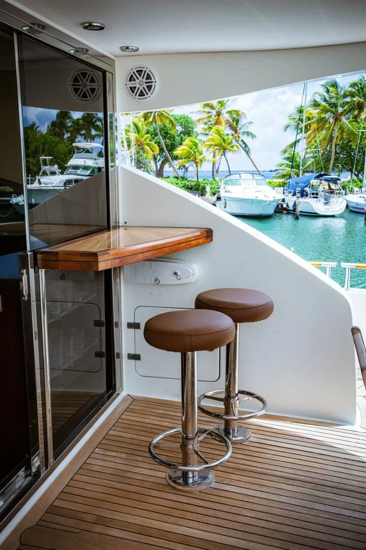 a kitchen with a bar stool aboard LOVIN LIFE Yacht for Sale