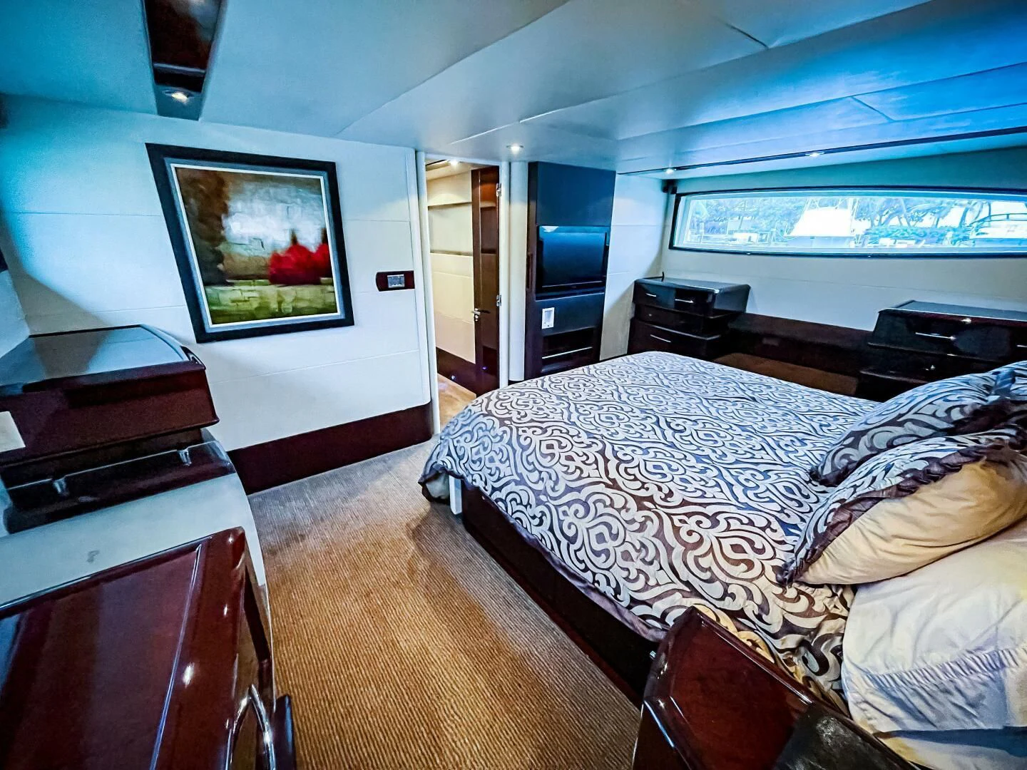 a bedroom with a large bed aboard LOVIN LIFE Yacht for Sale