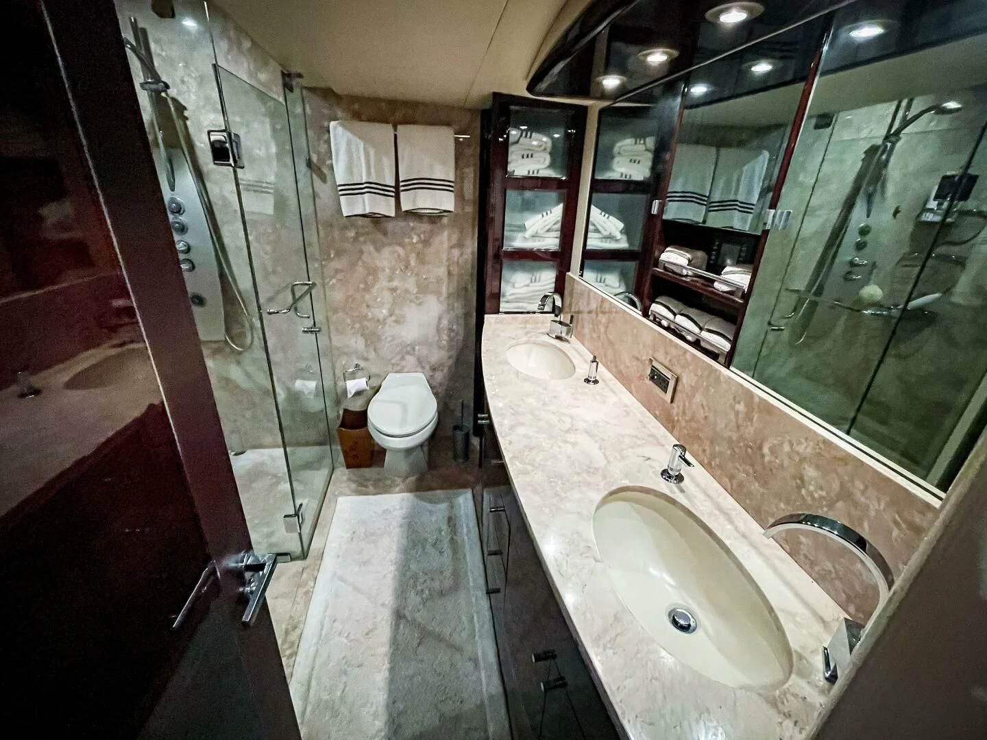 a bathroom with a large mirror aboard LOVIN LIFE Yacht for Sale