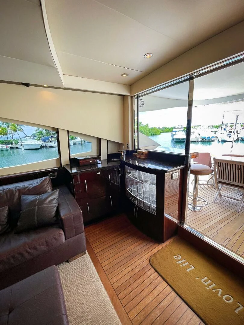 a living room with a large window aboard LOVIN LIFE Yacht for Sale