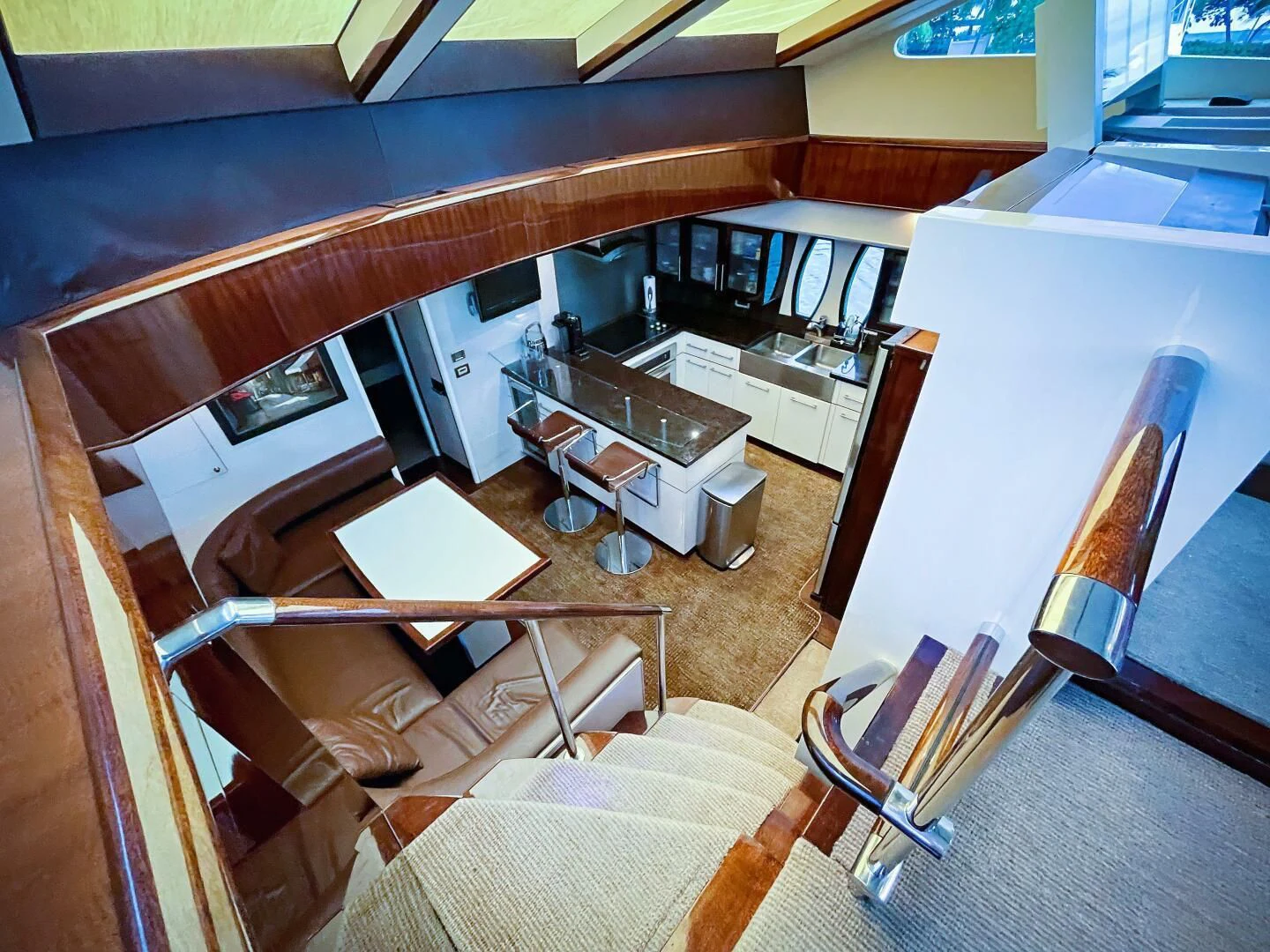 a room with a table and chairs aboard LOVIN LIFE Yacht for Sale